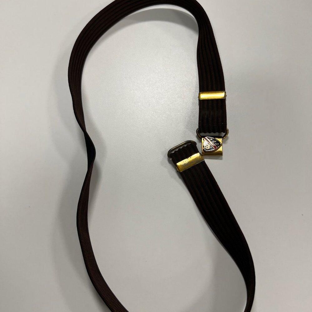 BROWN CASUAL BELT,CAN BE ADJUSTED 34-38, MADE IN USA BRASS BUCKLE. PARIS BRAND,